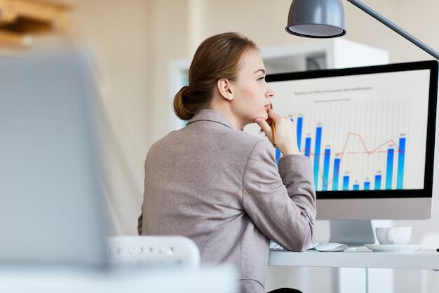 pensive-employee-analyzing-statistics_1098-12820.jpg.jpg